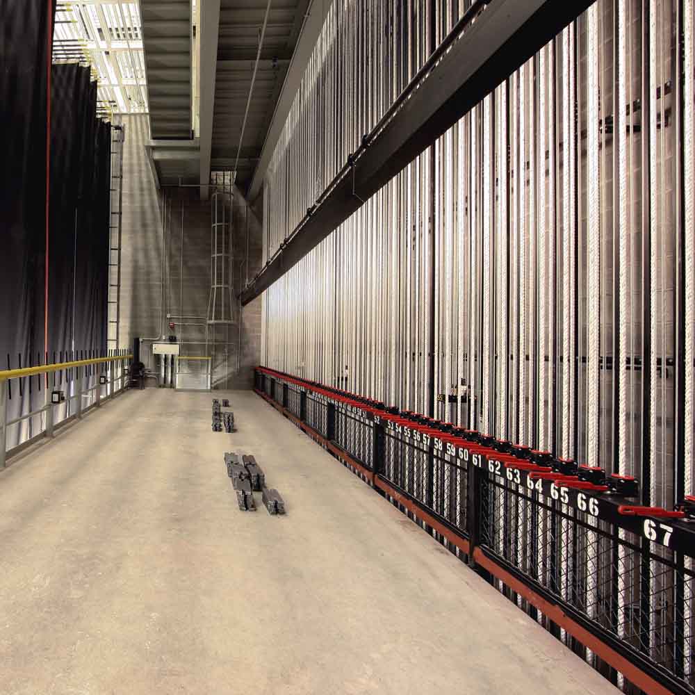 Hylton Performing Arts Center 1300-seat Merchant Hall fly gallery right.  The fly gallery has a second set of rope locks to allow moving the flymen to the gallery when the deck is very busy.  Normally these locks remain open while the locks downstairs are in use.